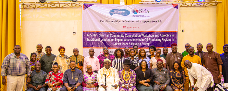 Group photo of traditional leaders, civil society members, and host community representatives at the Fair Finance Nigeria Townhall in Eket.