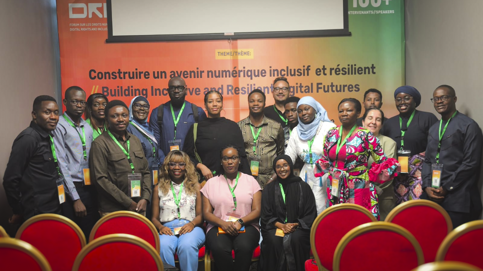 Group photo of attendees and speakers at a DRIF panel, gathered and smiling for the camera.