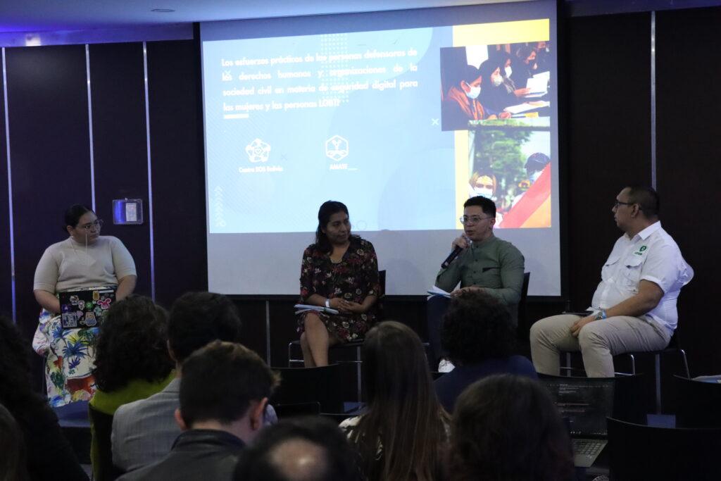 ReCIPE colleagues on stage, speaking on a panel at the LAC IGF.
