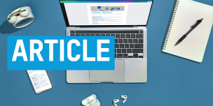 laptop, phone, and earbuds on a blue surface. Text overlaid reading "article".