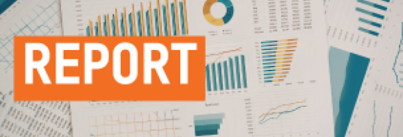 A collection of charts and graphs spread across a surface. Text reading "report".