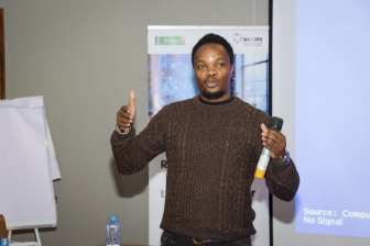A man speaks to an audience at a Digital rights training held by Mzalendo Trust in Kenya.