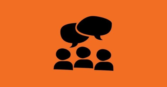 Three abstract figures with two overlapping speech bubbles above them, symbolizing conversation or discussion.