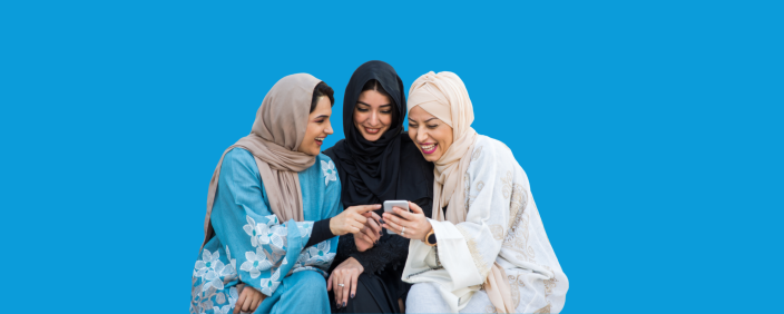 Cover image of three women smiling and looking at a phone