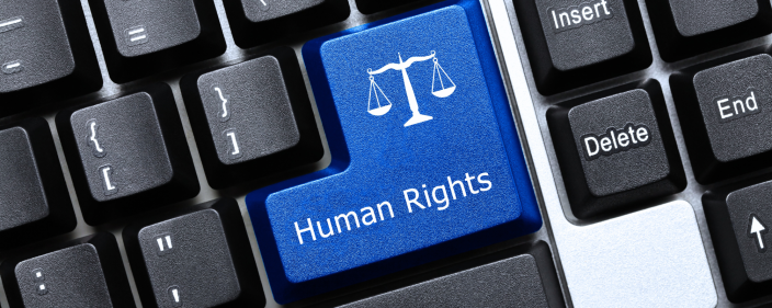 Image of a keyboard, with a key for human rights