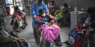 Foto: Rodrigo Abd / Oxfam Persona con covid19 en silla de ruedas
