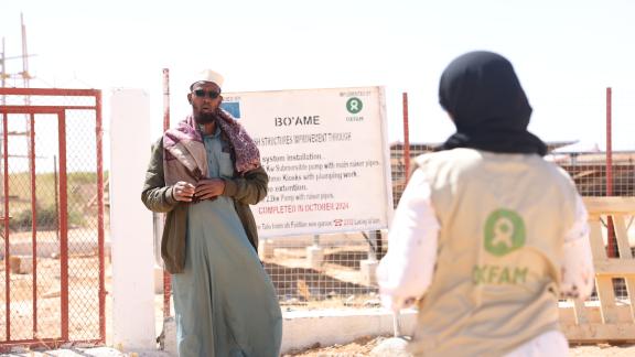 Abdirisaq Ali Salad, the district's water manager, recounts the dramatic shift in their daily lives.
