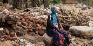 49-year-old Stevelia Aufi is sits on what used to be her home destroyed Cyclone Freddy in Phalombe southern Malawi on Friday 24 March 2023