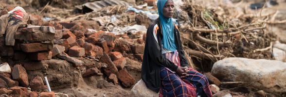 49-year-old Stevelia Aufi is sits on what used to be her home destroyed Cyclone Freddy in Phalombe southern Malawi on Friday 24 March 2023