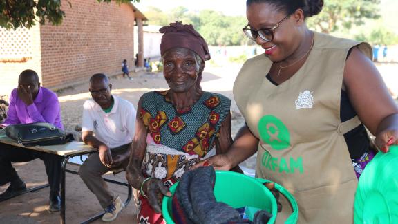 Author and Alindiine Nkolimbo at one of the distribution sites