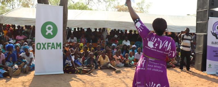 Female politician addressing a rally 