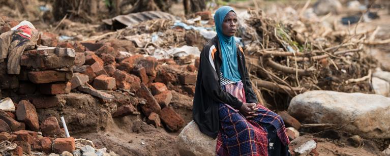 49-year-old Stevelia Aufi is sits on what used to be her home destroyed Cyclone Freddy in Phalombe southern Malawi on Friday 24 March 2023