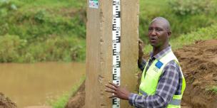 Moses Were is one of the community volunteers helping people in Doho Village monitor River Manafwa