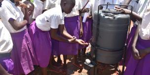 Proper hand washing as demonstrated by students of Illi Primary School, Omugo refugee settlement. Photo: Oxfam