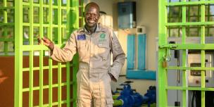 Veterino is a pump attendant at the motoraised water system plant in Imvepi settlement. Photo credit:Oxfam