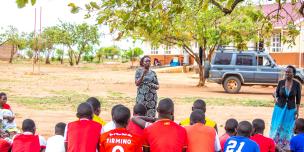 Namugaya Dinnah, Women Councilor Representing Alwi Sub-County in a career talk to the students of Alwi Seed Secondary School Pakwach, Uganda