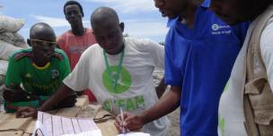 Oxfam Humanitarian Aid Workers in South Sudan help keep hope alive helping people like themselves. Photo credit: Oxfam