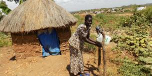 The use of Tippy Taps has been adopted in Rhinocamp settlement as a proper hygiene practice. photo credit: Oxfam