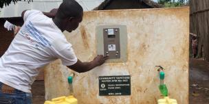 Fetching water from a water ATM.
