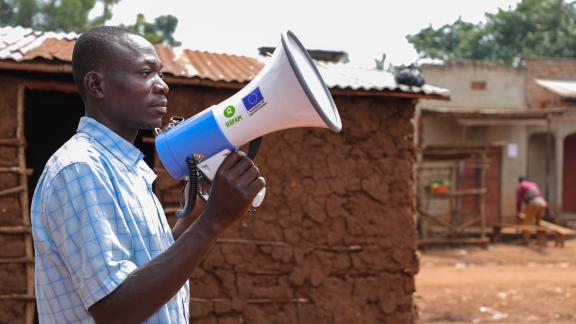 Alex Mutali a community announcer in Nambiti village sending out announcements via a megaphone Alex Mutali a community announcer in Nambiti village sending out announcements via a megaphone