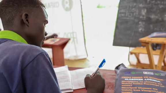 Dengen Moses (22 years) is attending lessons at Naror mobile learning centre.jpg