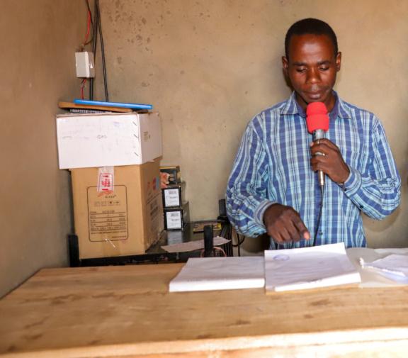 Henry Sirengo reading announcements at Nambiti community radio Henry Sirengo reading announcements at Nambiti community radio