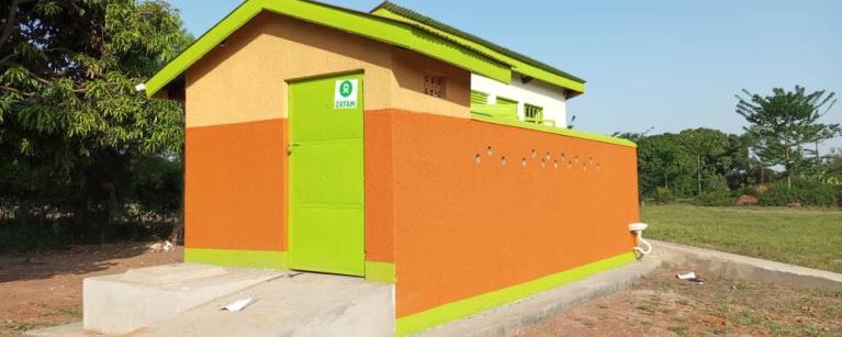 A photo of the completed 5 stances for Girl's latrine at Manafa primary school, Butaleja District
