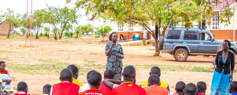 Namugaya Dinnah, Women Councilor Representing Alwi Sub-County in a career talk to the students of Alwi Seed Secondary School Pakwach, Uganda