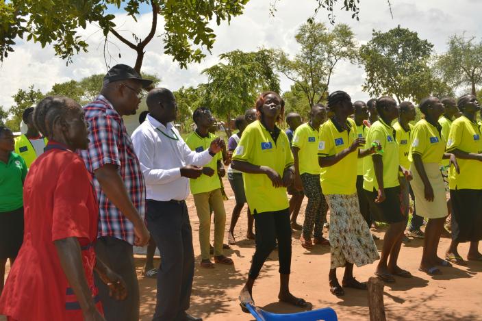 Peter joins Dynamic music group in a song on health. Photo credit:Oxfam