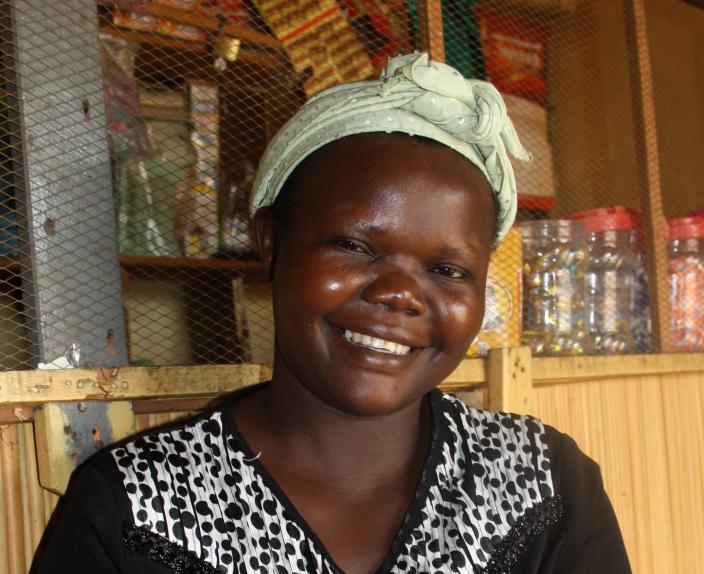 Oxfam supported farmer, Lilian Aguaru in her shop. Credit: Dorah Ntunga/Oxfam