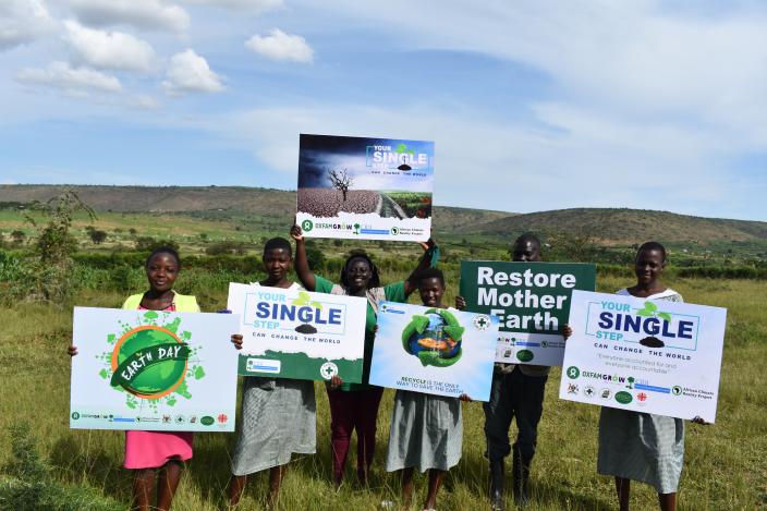 A group photo of Oxfam staff and partners on World Earth Day in Isingiro district 