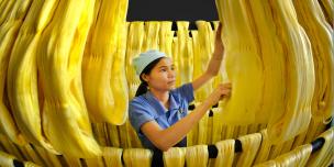 Factory worker makes noodles. Credit: Oxfam Vietnam