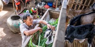 Farmer Hai with his goat in Ben Tre province. Credit: Oxfam Vietnam