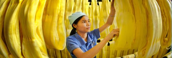 Factory worker makes noodles. Credit: Oxfam Vietnam