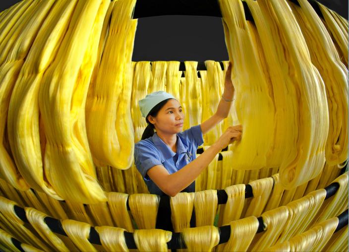 Factory worker makes noodles. Credit: Oxfam Vietnam